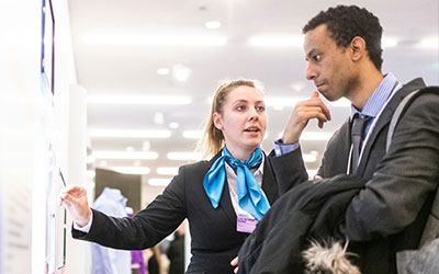 A careers advisor talking to a service user